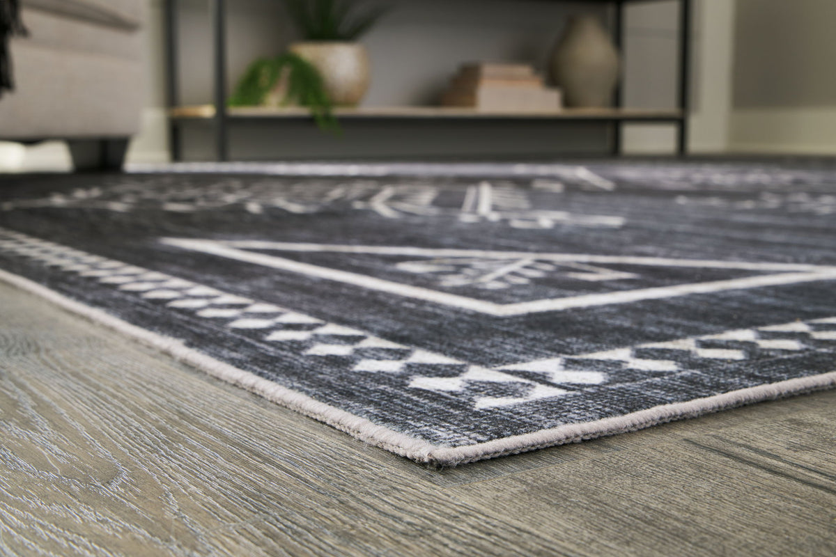 Arloman - 5' x 7' Rug - Black / Cream / Gray by Ashley – view 4