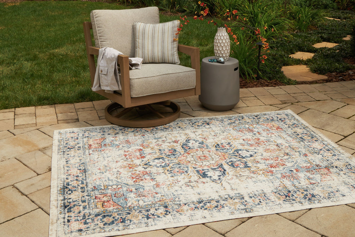 Jarrpage - Indoor/Outdoor 5' x 7' Rug - Multi by Ashley – view 4