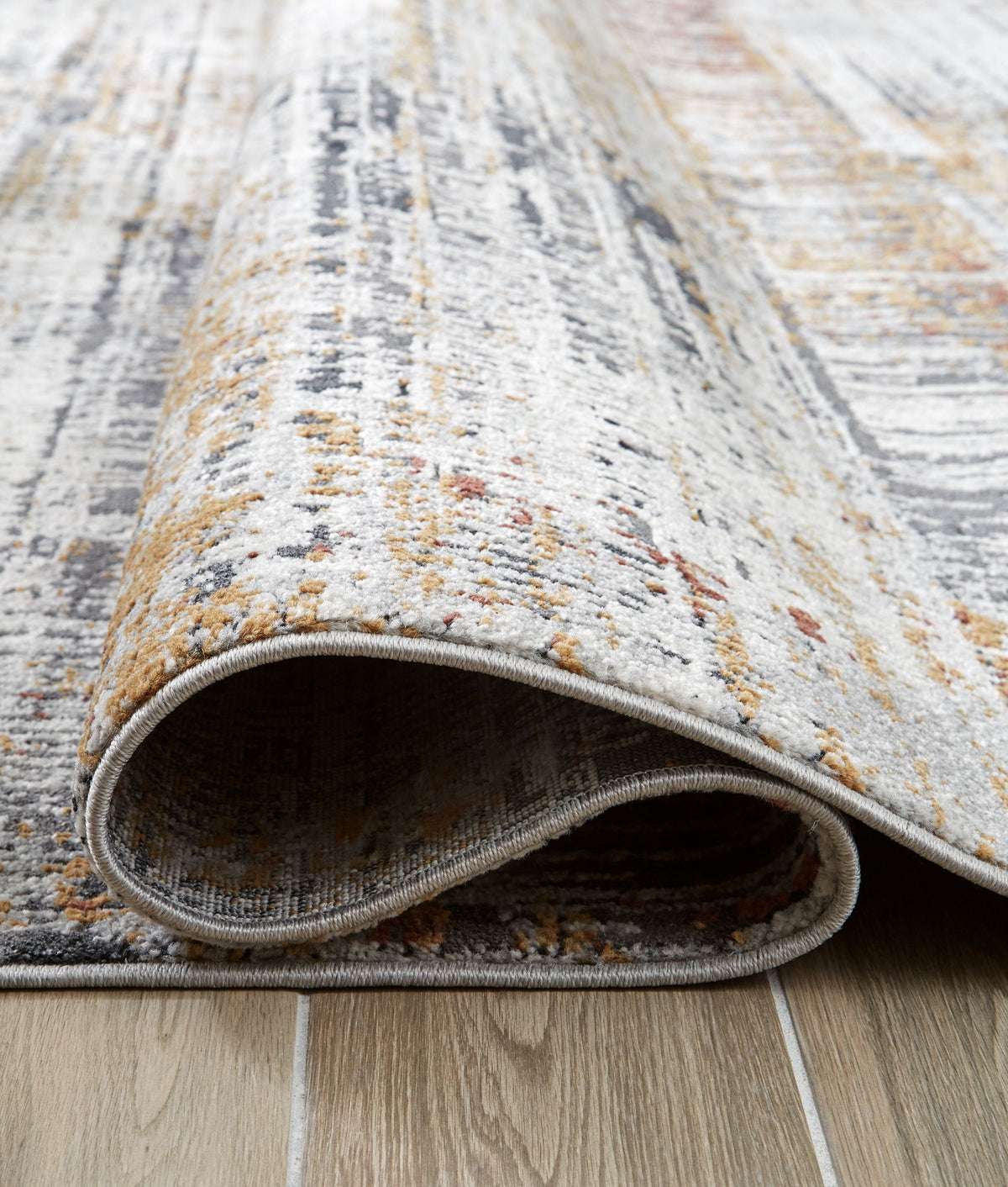 Rhettner - 5' x 7' Rug - Multi by Ashley – view 4