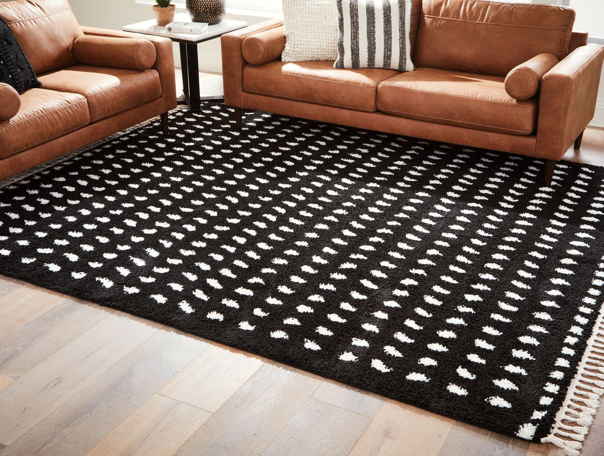 Minston - 5' x 7' Rug - Black / White by Ashley – view 2