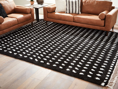 Minston - 5' x 7' Rug - Black / White by Ashley – view 2
