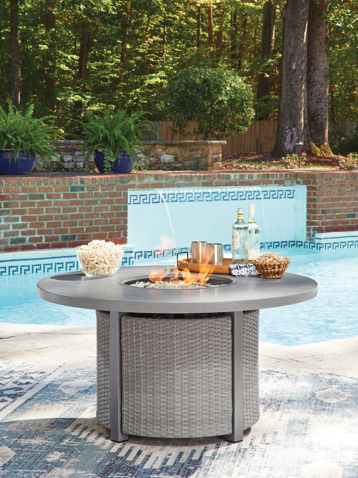 Half Moon Beach - Round Fire Pit Table - Gray by Ashley – view 3