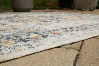 Jarrpage - Indoor/Outdoor 5' x 7' Rug - Multi by Ashley – view 3