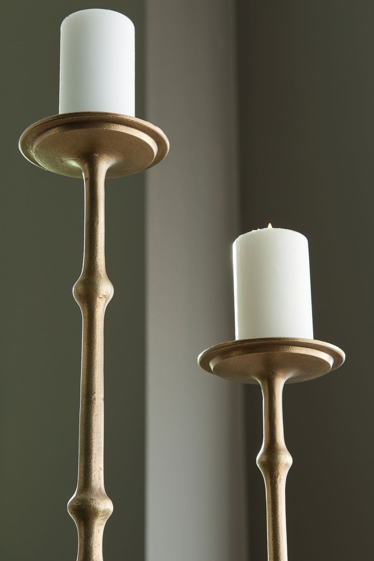 Larwick - Candle Holder Set (Set of 2) - Antique Brass Finish by Ashley – view 2