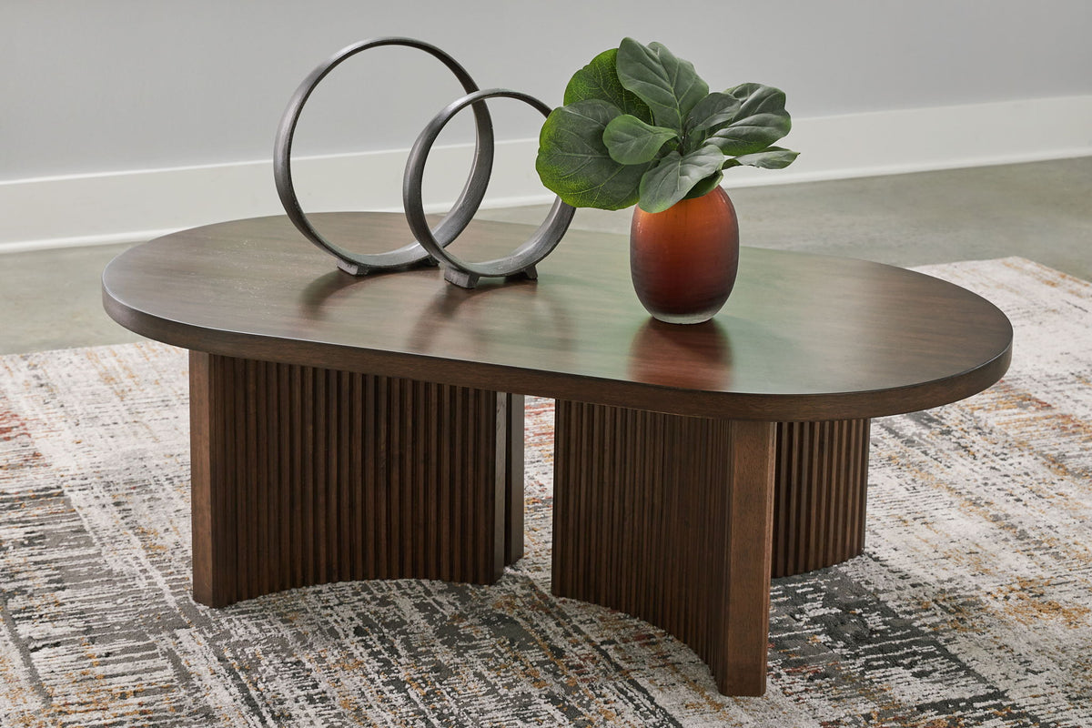 Korestone - Oval Cocktail Table - Dark Brown by Ashley – view 3