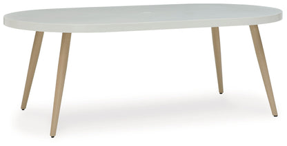 Seton Creek - Oval Dining Table With Umb Opt - White by Ashley – Dining Tables