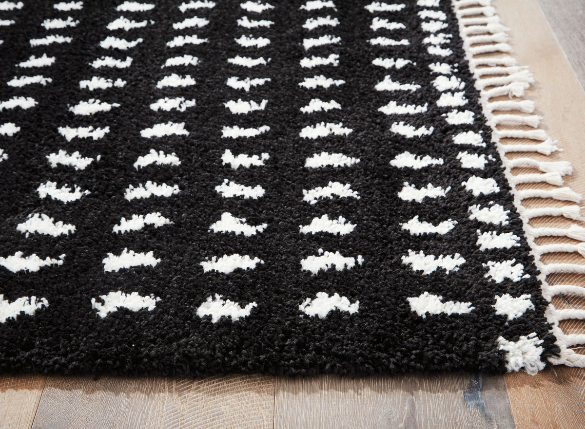 Minston - 5' x 7' Rug - Black / White by Ashley – view 3