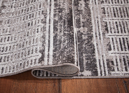 Henchester - 5' x 7' Rug - Multi by Ashley – view 3