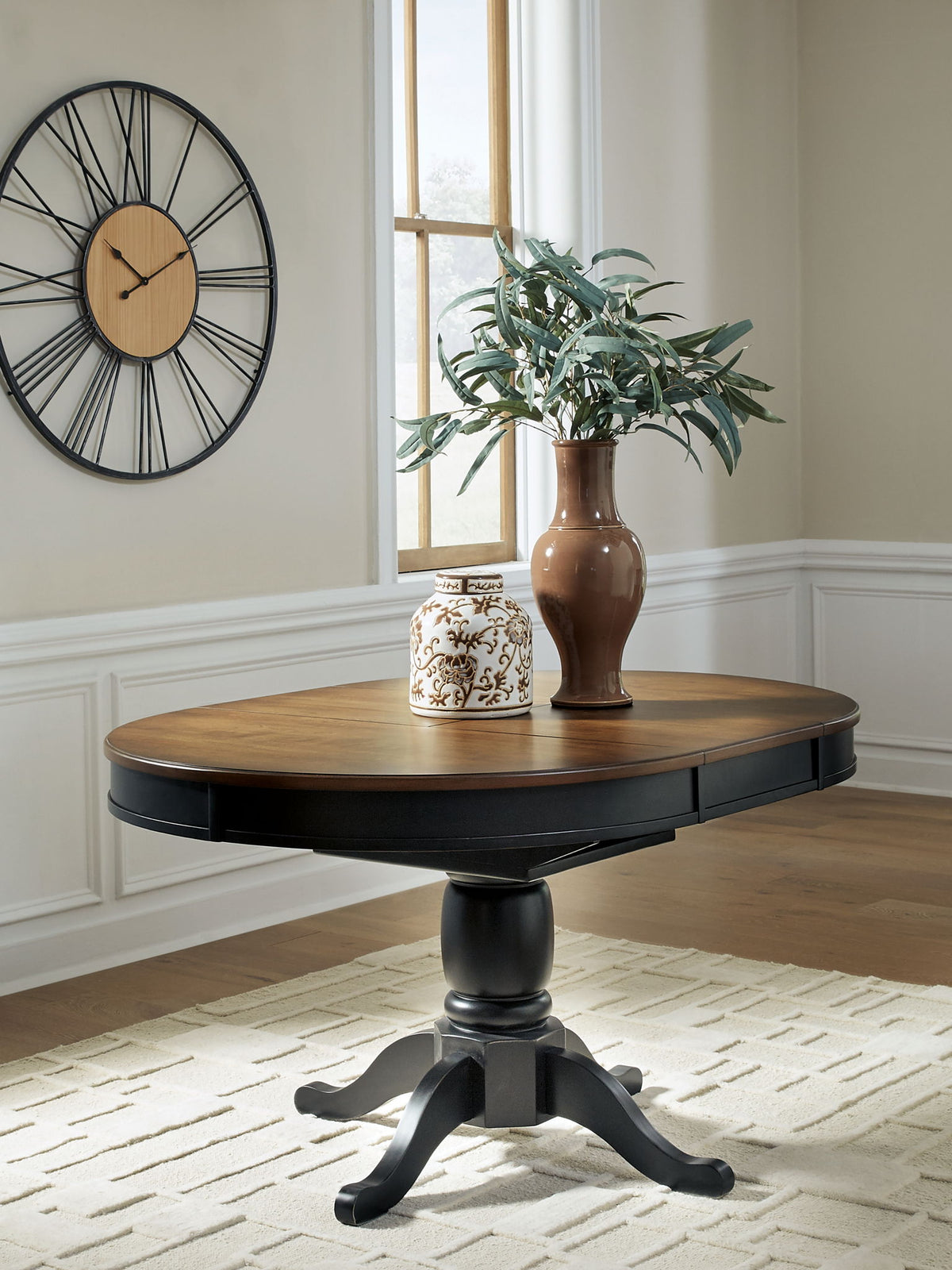 Clorazi - Oval Dining Room Butterfly Extension Table - Black / Brown by Ashley – view 3