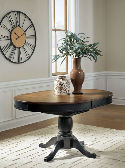 Clorazi - Oval Dining Room Butterfly Extension Table - Black / Brown by Ashley – view 3