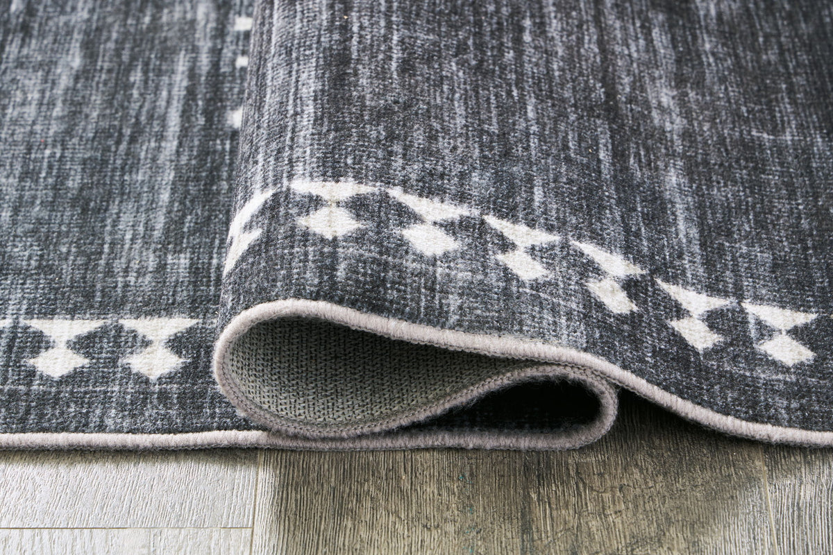 Arloman - 5' x 7' Rug - Black / Cream / Gray by Ashley – view 2