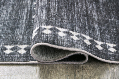 Arloman - 5' x 7' Rug - Black / Cream / Gray by Ashley – view 2