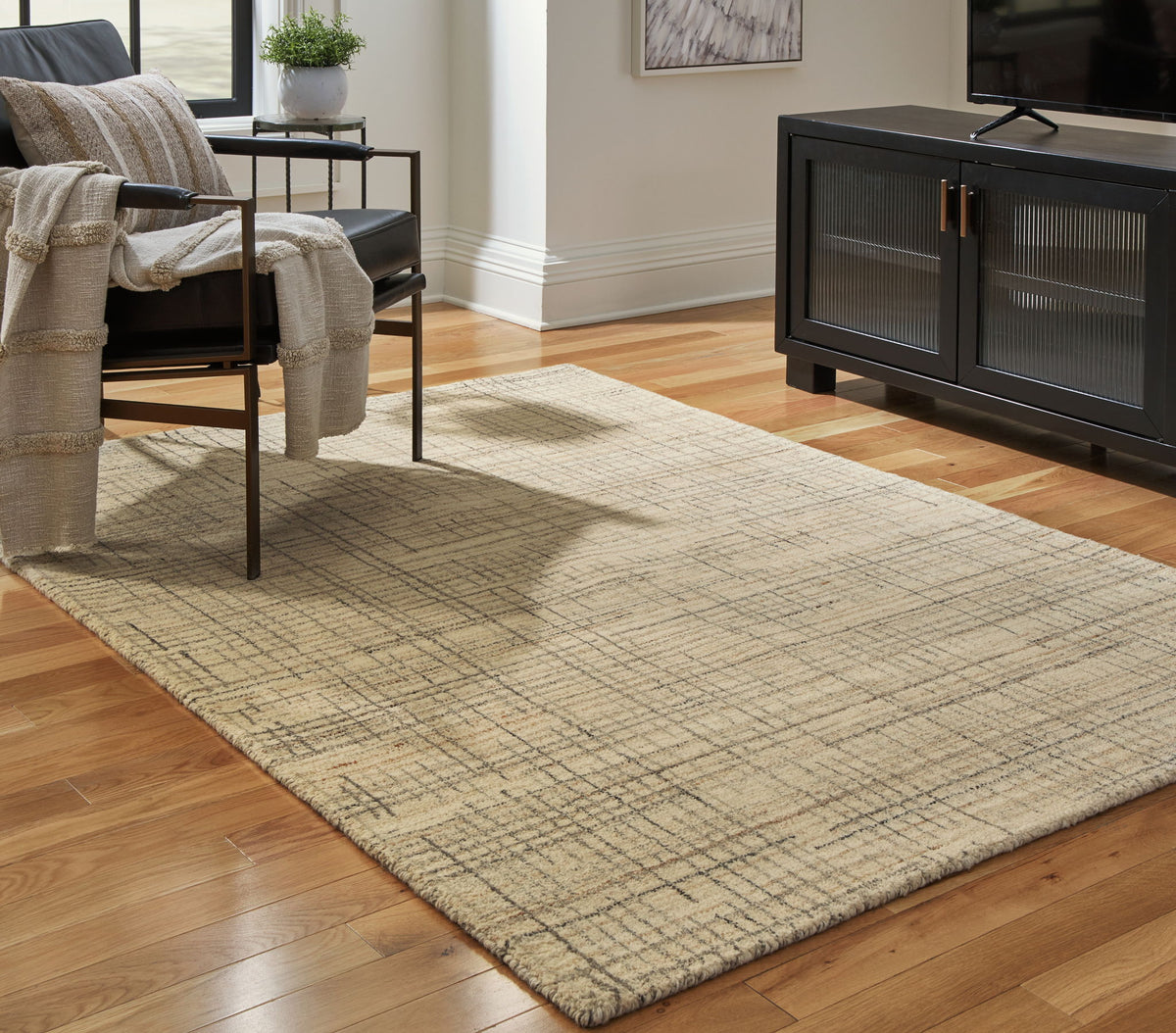 Janston - 5' x 7' Rug - Ivory / Gray / Tan by Ashley – view 4
