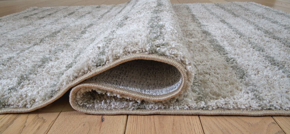 Laddway - 5' x 7' Rug - Cream / Green by Ashley – view 3