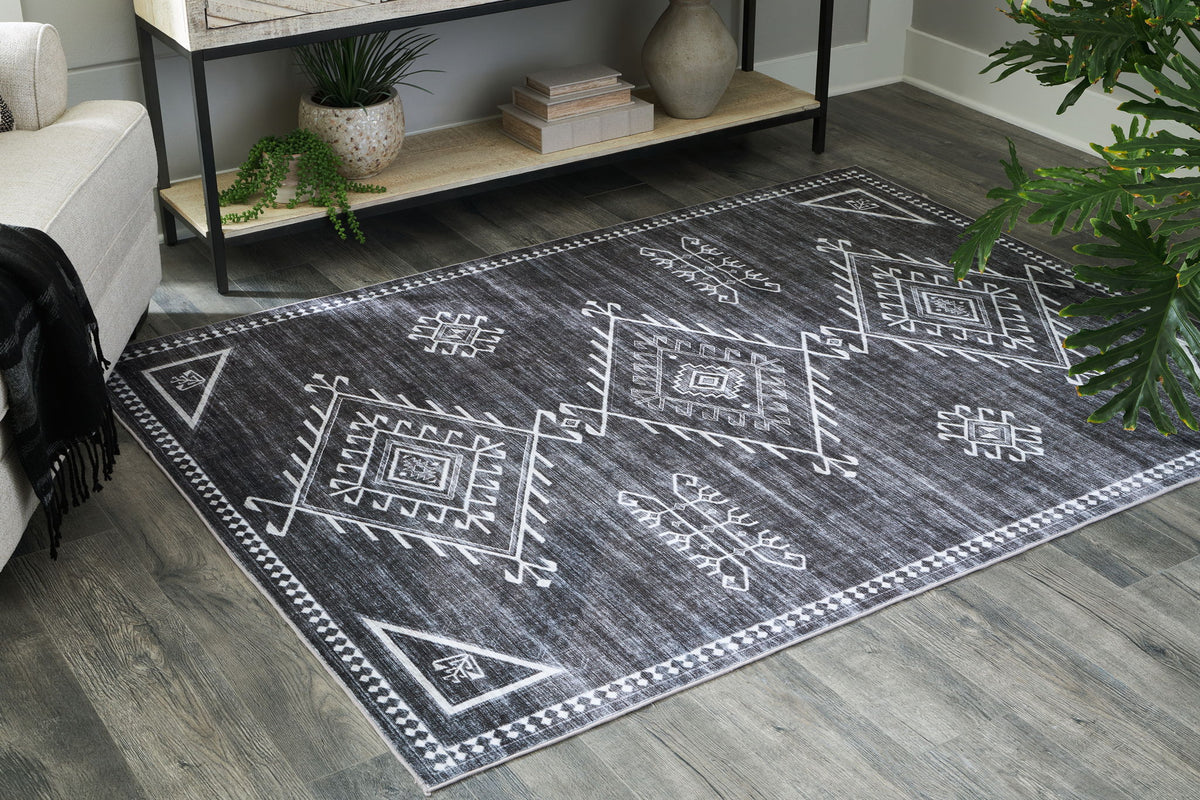 Arloman - 5' x 7' Rug - Black / Cream / Gray by Ashley – view 3