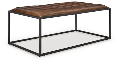 Junsor - Cocktail Ottoman - Brown / Black by Ashley – Coffee Table Ottomans