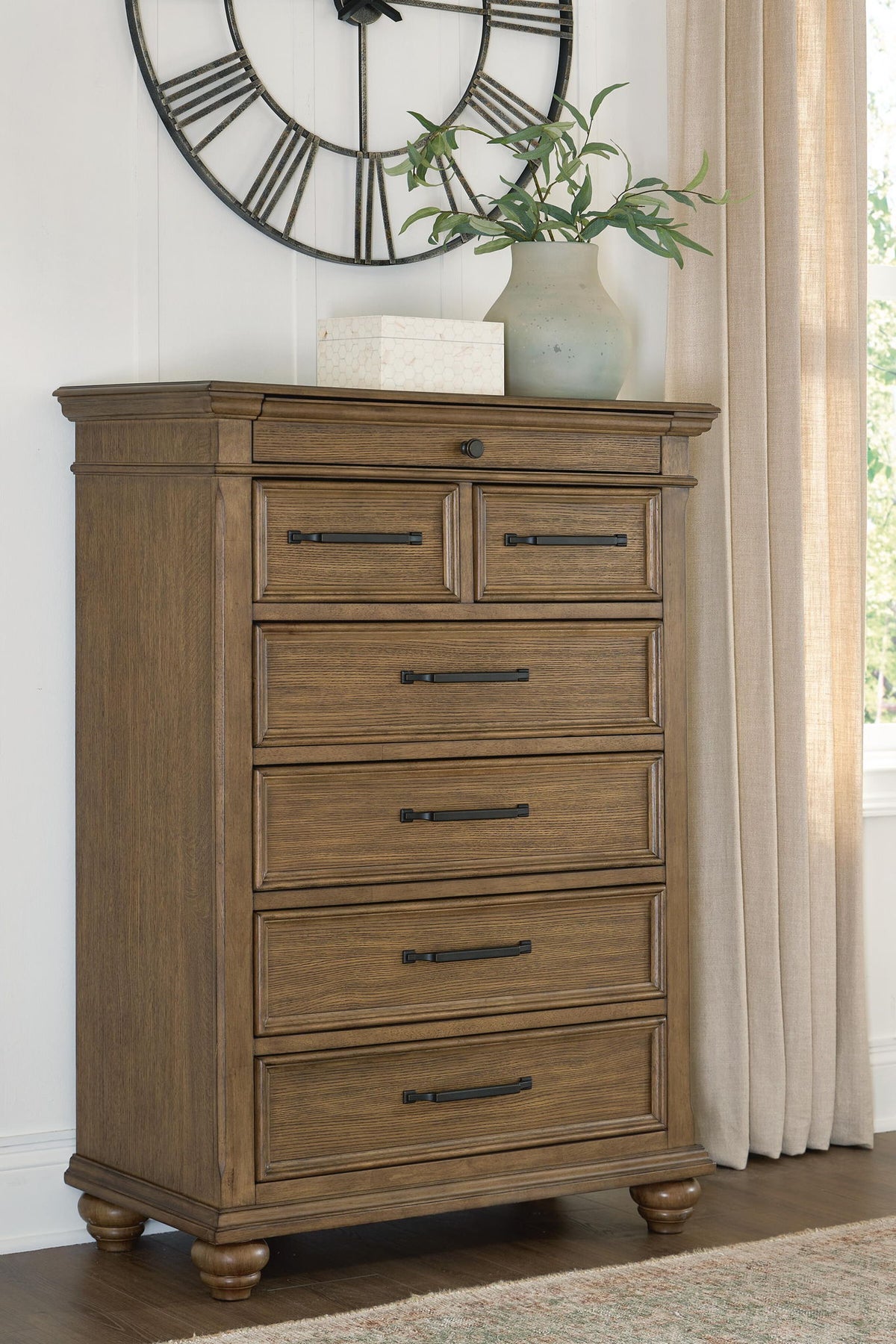 Karallin - Seven Drawer Chest - Medium Brown by Ashley – view 3