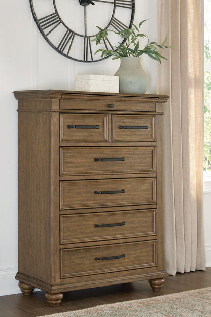 Karallin - Seven Drawer Chest - Medium Brown by Ashley – view 3