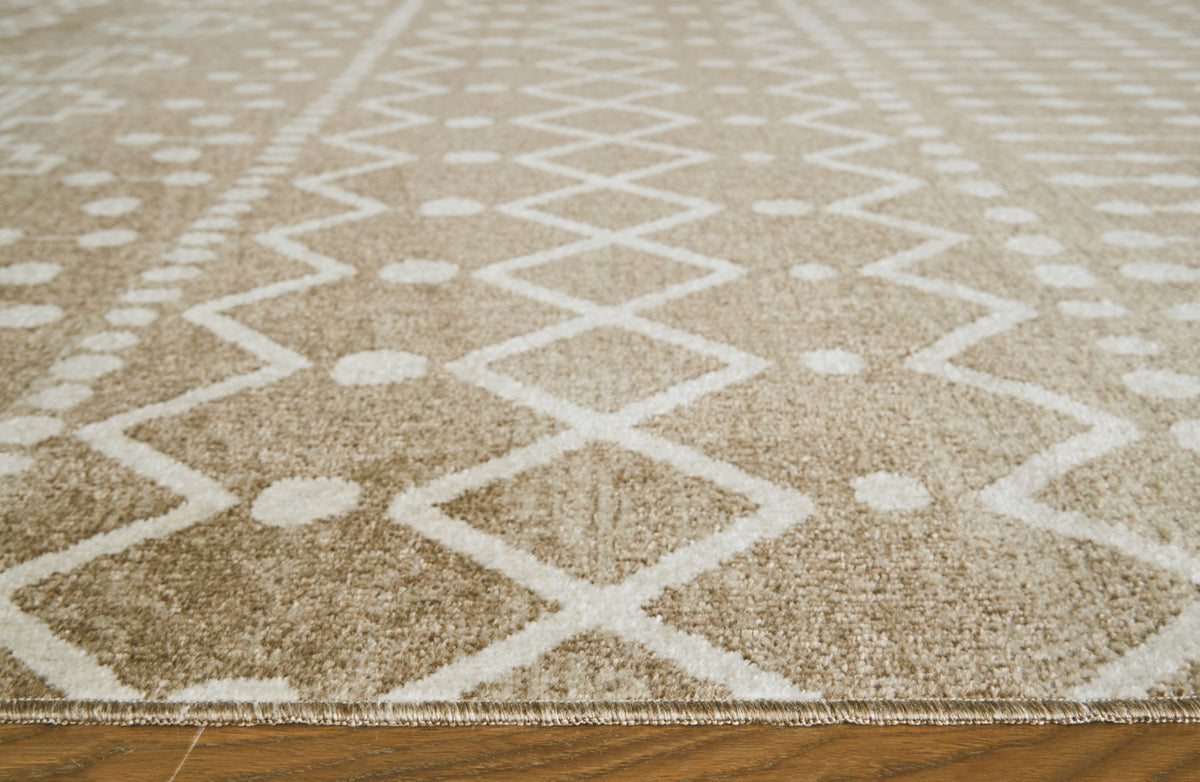 Bunchly - 5' x 7' Rug - Tan / Brown / Cream by Ashley – view 3