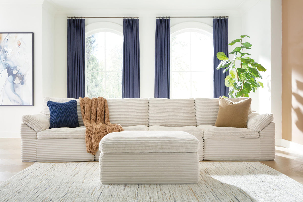 Fannin - 4-Piece Sectional With Ottoman - Ivory by Ashley – view 4