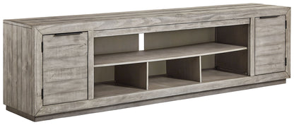 Naydell - XL TV Stand With Fireplace Option - Gray by Ashley – TV Stands