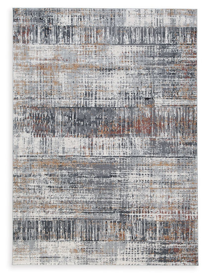 Rhettner - 5' x 7' Rug - Multi by Ashley – Area Rugs